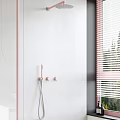 Stylish Pink Shower System on White Bathroom Wall with Blinds and Green Outdoor Plants