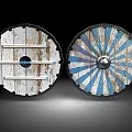 Medieval Shields With Wooden Texture Horizontal Stripes Blue White Radial Patterns And Central Metal Bosses