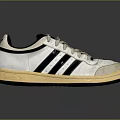 Vintage White Athletic Shoes With Black Stripes Beige Laces And Cream Sole