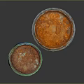 Household Paint Cans with Spilled Green Orange Paint and Colorful Labels on Reflective Surface