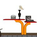 Stylish Console Table With Red Top Orange Base Vase Radio Photo Frame And Books
