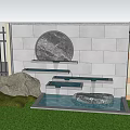 Gray Stone Brick Courtyard Background Wall With Round Marble Decoration Water Feature And Green Plants