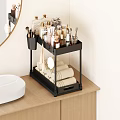 Modern Black Bathroom Cabinet Rack With Toiletries Brushes And Stacked Towels