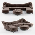 Elegant Brown Velvet Sectional Sofa with Curved Design and Round Ottoman
