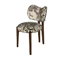 Stylish Dining Chairs With Floral Patterned Fabric And Wooden Legs Design
