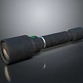 Black Handheld Flashlight Hardware Tool With Green Button And Textured Surface Design