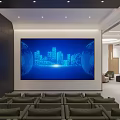 Modern Public Office Space with Rows of Seats Large Blue Screen Black Paneled Walls and Recessed Lights