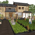 Traditional Chinese Garden with Vegetable Beds Wooden Walkway Umbrellas Tables and People Walking