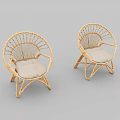 Two Rattan Leisure Chairs with Round Woven Backrest and Light Colored Cushioned Seats