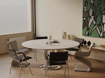 Modern Round White Dining Table Set With Black And Gray Chairs And Colorful Wall Art 3d model