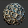 Unique Wooden Stone Sphere With Intricate Pockmarked Surface And Mixed Color Tones