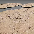 Damaged Ground Surface With Scattered Stones On Yellowish Brown Soil And Gray Background