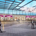 Glass Roof Plaza With Purple Spargo's Signage People Walking On Stone Paved Ground