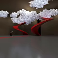 Art Installation Featuring Red Spiral Staircase With White Cloud Like Decorations And Red Carpet