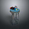 Blue Worn Edges Tabletop Stool With Metal Curved Pattern Legs And Red Blue Striped Thermos