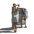 Woman Wearing White Towel Standing on Green Grass Next to Wooden Screen with Hanging Clothes