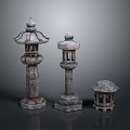 Traditional Stone Lanterns With Different Sizes And Intricate Carved Details