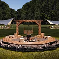 Lush Campsite With Circular Fire Pit Wooden Swing Stone Border And Grass Area Under Trees