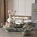 Elegant Crystal Glass Coffee Table With Floral Vase Books And Fireplace Background