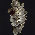 Intricate Venetian Mask With Golden Feathers Red Rose And Ornate Patterns