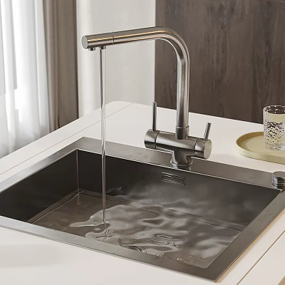 Stainless Steel Kitchen Sink With Water Flowing From Faucet On Countertop 3d model
