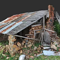 Rustic Garden Landscape With Old Dilapidated House Damaged Roof Stone Walls And Weeds