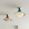 Two Modern Ceiling Lights With Blue Red Accents And White Shades On Ceiling