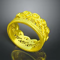 Elegant Gold Ring With Intricate Carved Patterns And Ornate Decorative Design