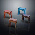 Red Blue and Brown Wooden Stools With Simple Design On Dark Background