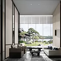 Modern Elegant Lounge Area With Floor-to-Ceiling Windows Sofa Coffee Table And Courtyard View
