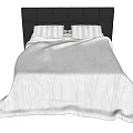 Double Bed With Black Upholstered Headboard And Striped Pillows White Comforter