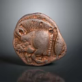 Ancient Animal Figure Sculpture Carving With Detailed Texture And Rustic Surface