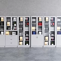 Modern Gray Bookcase With Multiple Compartments Books Folders Potted Plants And Glass Doors