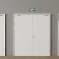 White Safety Doors With Green Emergency Exit Signs In Building Area