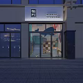 Moufang Global Travel Theme Bookstore Night View With Glass Doors And Whale Decorations