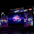 Dance Hall Stage With Purple Lighting Music Festival Party Atmosphere And Sound System