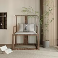 Natural Wooden Single Chair with Light Cushions Blue Accent Green Plant and Open Book