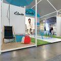 Chusco Exhibition Booth With White Structure Blue Elements Green Lawn And People