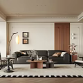 Modern Living Room Interior With Black Sofa Coffee Table Rug Floor Lamp And Framed Art