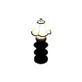 Decorative Table Lamp Featuring Patterned Ceramic Base Black Tiered Stand And Beige Tassel Lampshade