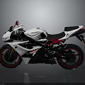 Sporty Suzuki Motorcycle With White Body Red Accents And Black Seat