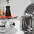 Modern Silver Metal Single Chair With Glass Table And Decorative Items