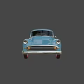 Blue Vintage Car With Classic Design Rounded Body And White Wall Tires