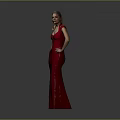 Woman in Red Long Dress Standing with Hands on Hips Against Gray Background