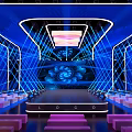 Modern Stage Design Featuring Blue Neon Lights Audience Seats Floral Backdrop And Central Logo