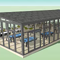 Glass Enclosed Lounge Area With Open Design Tables And Comfortable Chairs