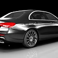Modern Black Sedan Car With Sleek Exterior And Silver Alloy Wheels