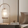 Elegant Modern Bedside Table Lamp With Metal Frame Glass Shade And Soft Illumination