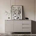 Modern White Entryway Console Cabinet with Framed Artwork Green Plant and Black Figurine