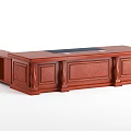 Elegant Wooden Office Desk With Carved Details And Black Writing Pad